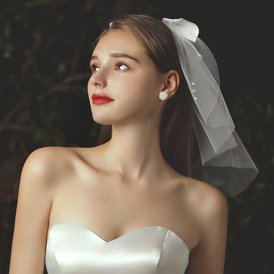 Elegante Hochzeit Braut Hochzeit Kopfschmuck Weißer Schleier Kopfschmuck Imitationsperle Schleife Kurzer Schleier Hinterkopfdeko Haaraccessoires
