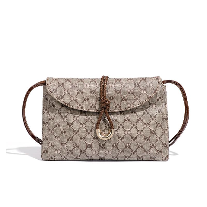 

Summer new retro presbyopia bag commuter versatile hand-held envelope bag women s premium texture light luxury messenger mobile phone bag