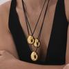 Oumika Geometric Pendant Necklace: High-Polished Stainless Steel with Black Cord, Clavicle-Length, Non-Fading, European & American Style.