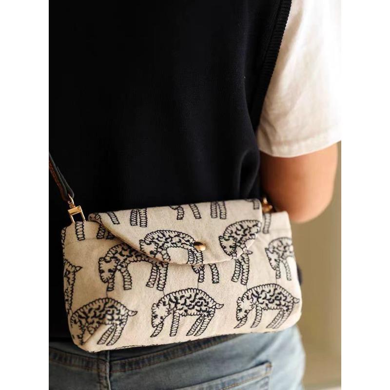 

Embroidered portable mobile phone bag women s new messenger bag women s bag large capacity shoulder mini satchel