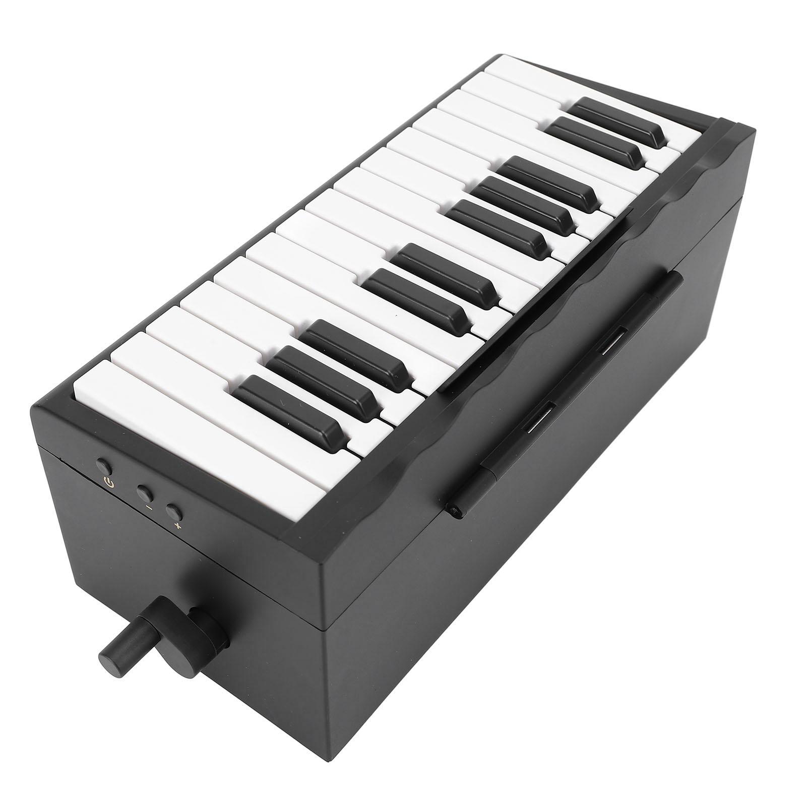 

Гральний фортепіанний календар з 27 картками, 25 клавіш, регулювання гучності, акумулятор 1000 мАг, ручний генератор, настільний календар на 2025 рік