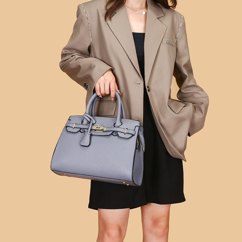 Bag women's early spring new simple solid color shoulder bag fashion temperament lychee pattern handbag