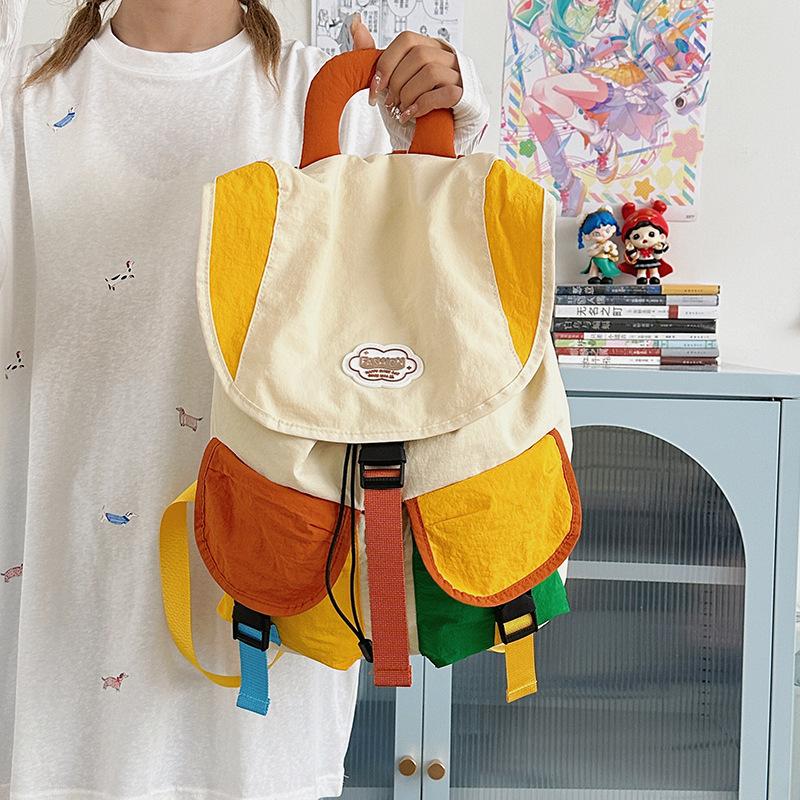 Fashion and leisure outdoor mountaineering bags for men and women, color matching travel backpack, large capacity and lightweight student schoolbag