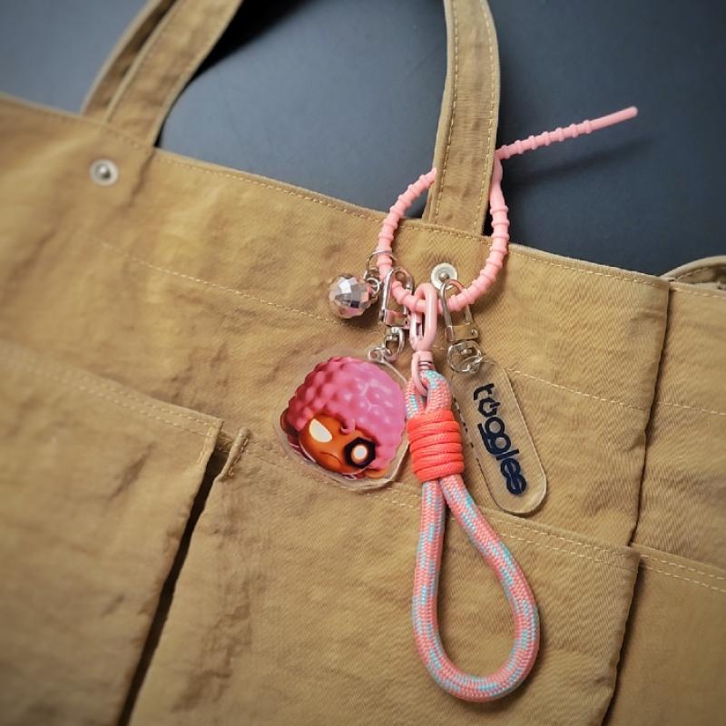 Toggles   04 Pink Disco Face Keyring