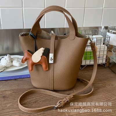 Die beliebten kleinen Taschen für Damen Herbst und Winter 2025 neue Kinder- und Mutter-Umhängetaschen Retro tragbare Beuteltaschen