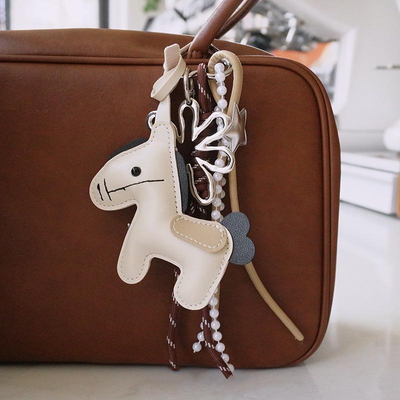 

Yogodlns Candy Color Faux Leather Horse Mini Backpack Hanging Handbag Pendant Bag Pendant Bags Accessories one size бежевий