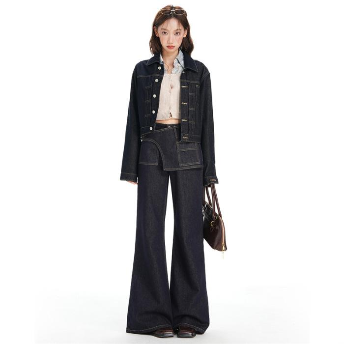 Dark blue retro asymmetric waist seal design sense slightly pull jeans women's autumn and winter 11 new fake two-piece wide-leg pants