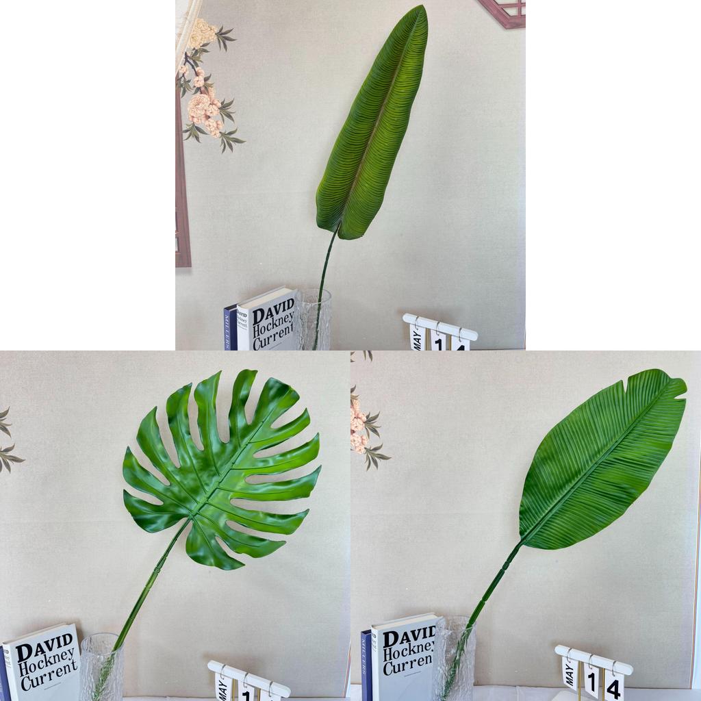 Dekoration i form av en falsk bananbladsfläkt för bröllop och heminredning