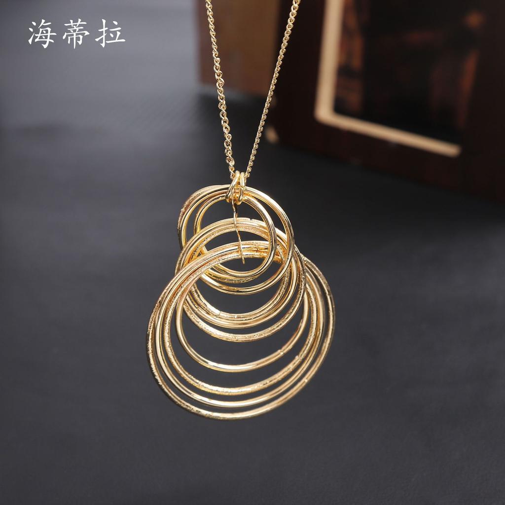 New Geometric Ring Stacked Long Sweater Chain, Fashionable and High-end Women's Versatile Ring Long Pendant