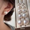 New Year's Pearl Stud Earrings: Women's Versatile 925 Silver Needles with Milky White Pearls