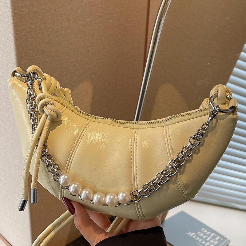 Nischen-Design-Tasche Damen Sommer Neue Mode Horn-Tasche Mode Knödel-Tasche Schulter-Umhängetasche