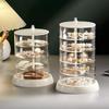 Transparent rotating jewelry organizer with multiple layers, large-sized cushion puff and beauty sponge storage rack, rotatable