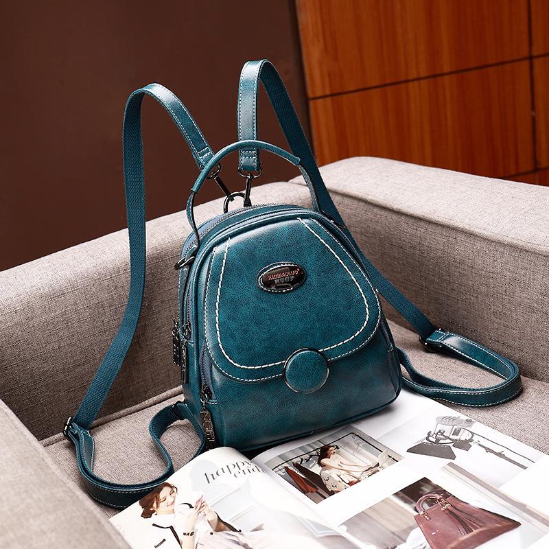 

Summer New European and American Retro Style Handheld Single Shoulder Cross Shoulder Pillow Soft Bag Small Square Dual Use Women s Bag озеро синього кольору