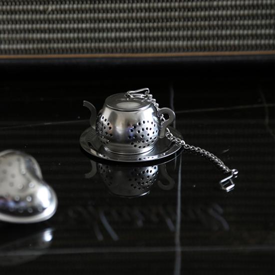 Čajový spařovač Pěkně vypadající stabilní přenosný nerezový čajový hrnec Tvar listového vyluhovače Sítko na koření do kuchyně