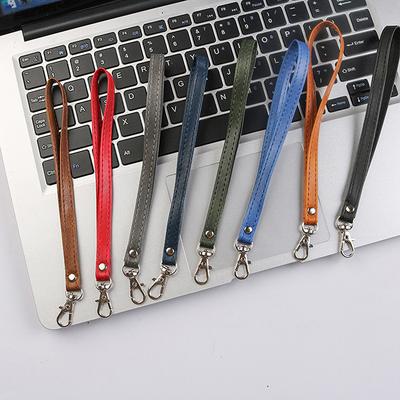 Étui en cuir de vache plat à grain fin pour téléphone portable Cordon de suspension Dragonne universelle Dragonne Couleur unie Cuir Métal Porte-clés