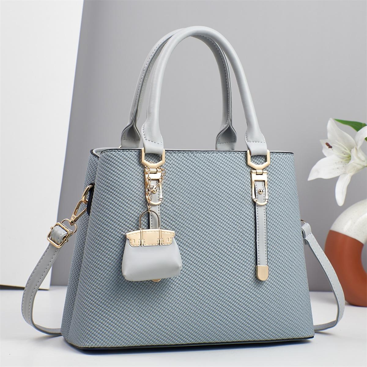 Новая модная стильная сумка высокой ценности Универсальная сумка через плечо большой вместимости Простая и атмосферная сумка-тоут Макарон .