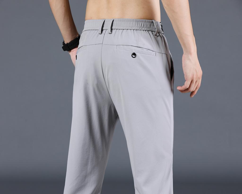 Pantalones casuales finos de primavera/verano para hombre, pantalones de seda helada para hombre, pantalones rectos ajustados coreanos de moda para hombre