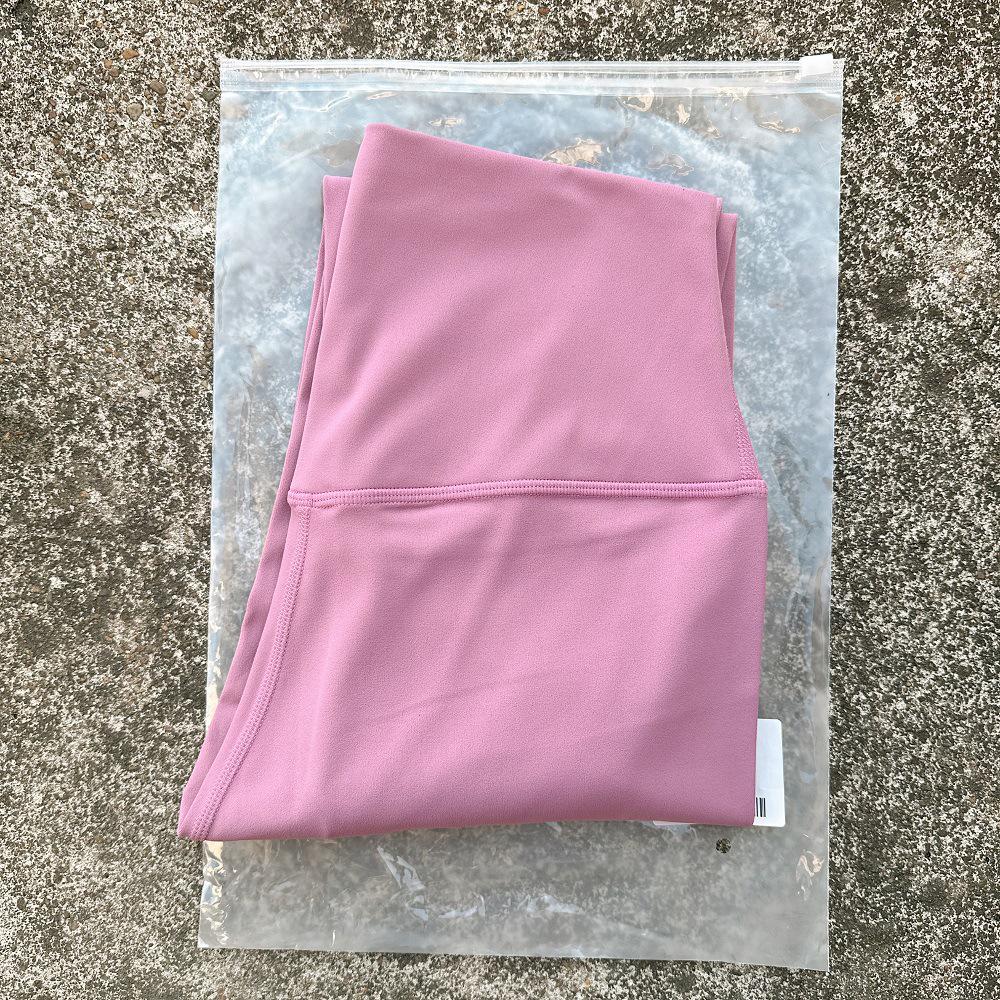 Solid Color High-Waisted Women's Yoga Leggings with Back Pocket – Soft, Elastic, and Peach Bum Enhancing