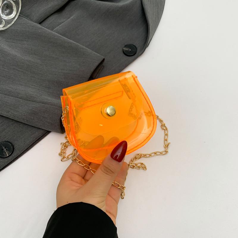 

Casual personality simple chain bag fresh and sweet jelly transparent saddle bag fashion trend single shoulder oblique span bag помаранчевий
