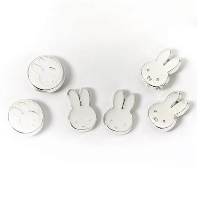 Set di orecchini a bottone