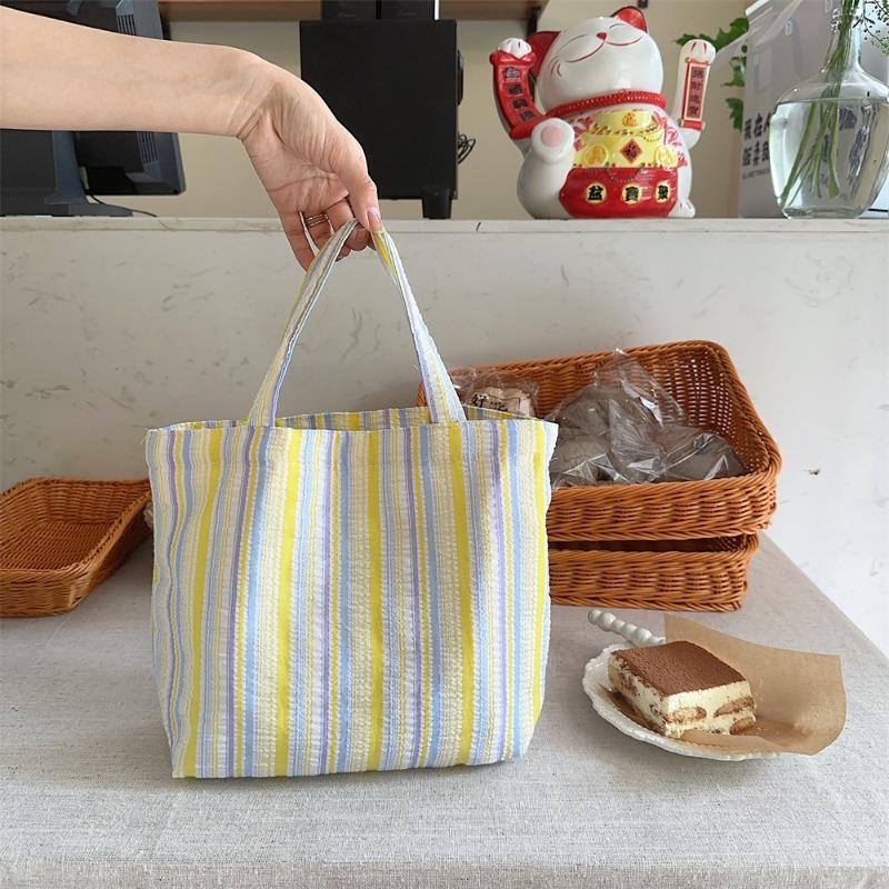 Spring and summer new pleated striped canvas bag portable bento bag storage bag large capacity hand carry