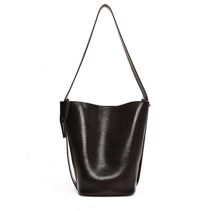 

Нишевая сумка-ведро, незаменимая вещь в стиле ретро. кофейный