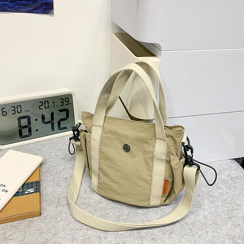 New casual handbag bucket bag fashion niche design bucket bag women's lightweight spring shoulder messenger bag
