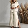 Completo estivo casual da donna in due pezzi, top ampio a maniche corte con pantaloni a gamba larga, outfit leggero e comodo per l'uso quotidiano