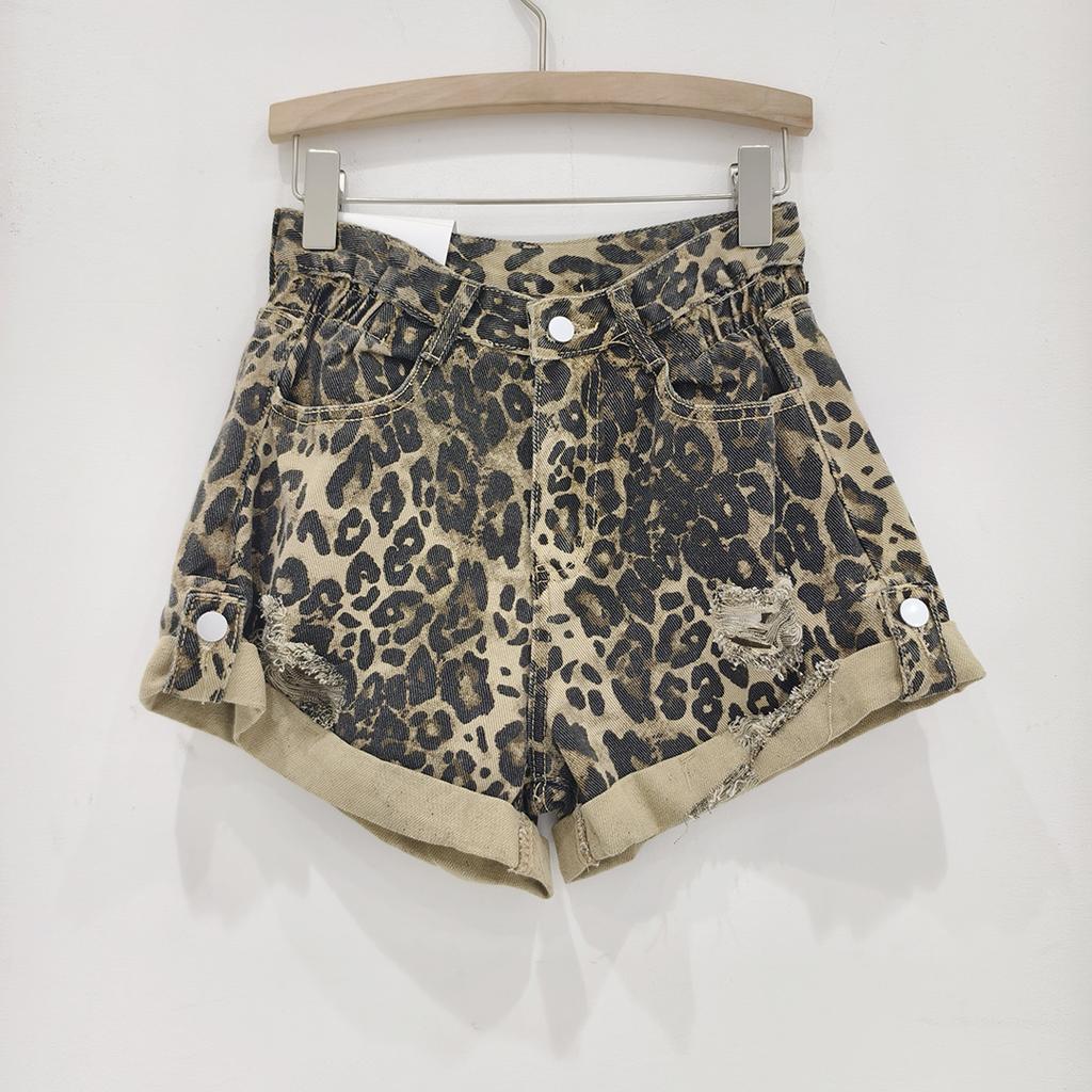 Moda estiva a-line pantaloni corti larghi arricciati vita alta versatili stampa leopardata denim lavato strappato pantaloncini donna tendenza
