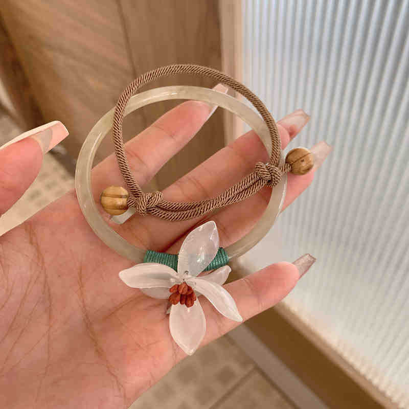 

Акриловый цветок плетеный деревянный бусинный браслет из двух частей легкая роскошь нишевая мода универсальные высококлассные темпераментные украшения