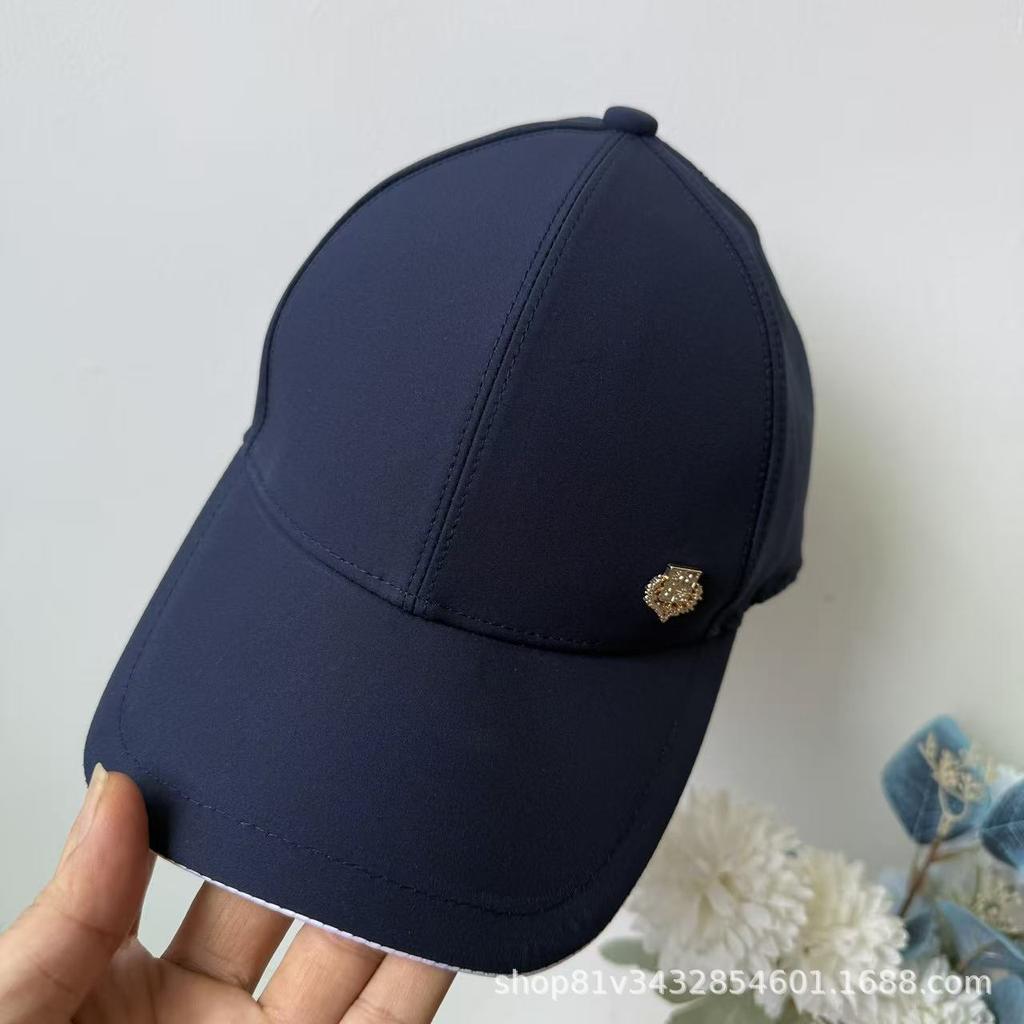 European and American hard top metal label baseball cap women's four-season models show a small face, fashionable foreign style sunscreen cap tide
