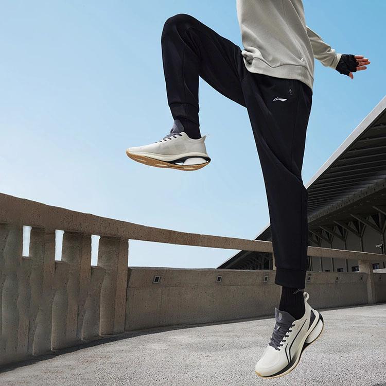 Li Ning Fitness Series Solid Color Non-Stretch Mid-Waist Tapered Knit Sports Pants Men Bottoms Black AKLT439-1