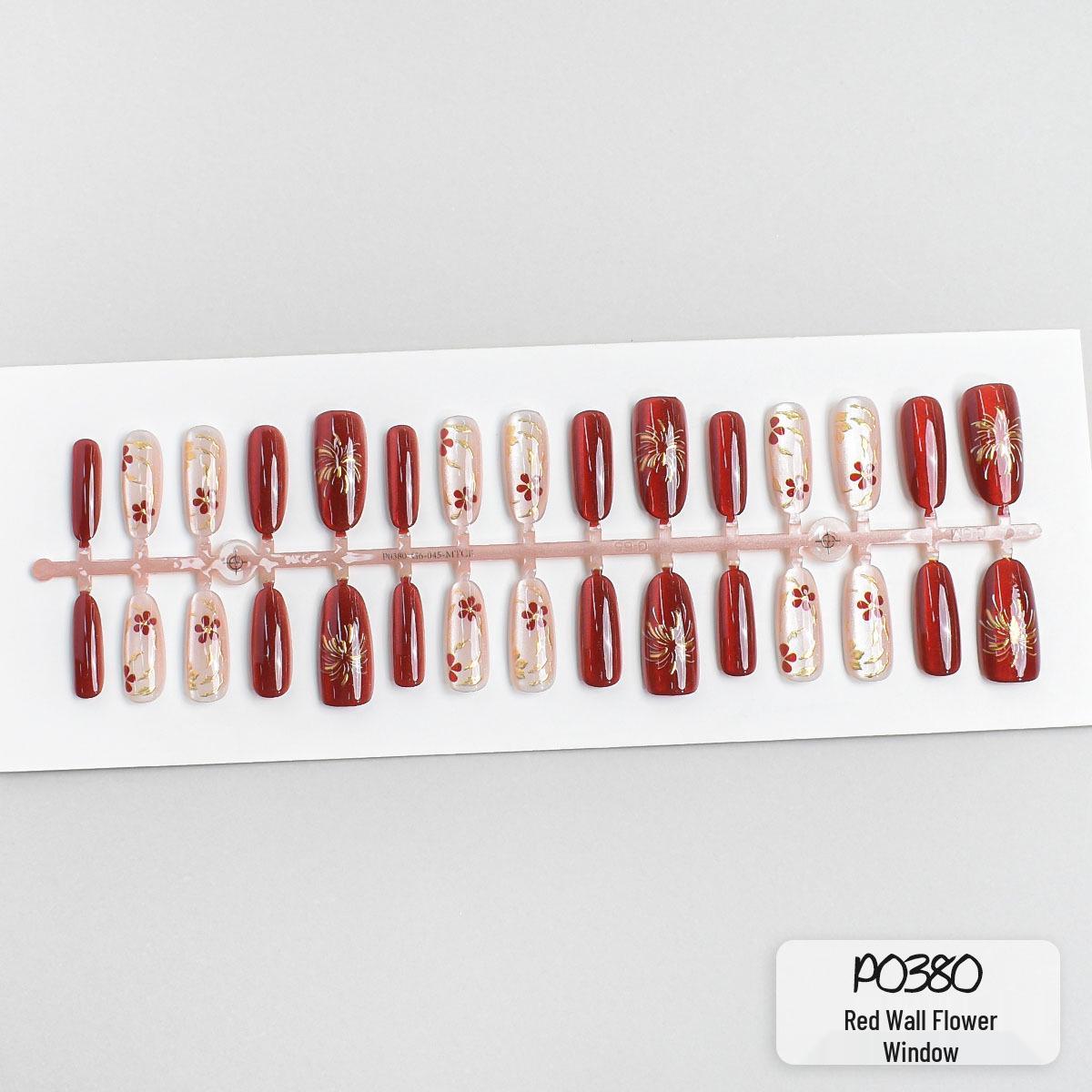 

Red Wall Flower Armor: Festive Chinese-Style Cat Eye Nail Art with Enamel Beads