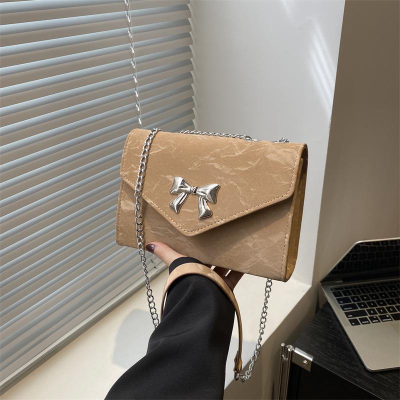 Textured bag women's 2025 new bow chain shoulder bag foreign style personality trendy crossbody commuter small square bag