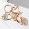 Exquisite Shell Keychain Conch Starfish and Star Pendant Keyring Bag Decoration Fashionable Beach Vacation Accessory