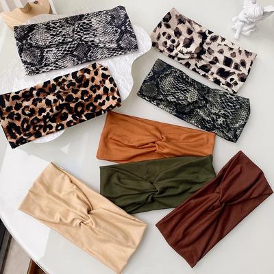 Modne Damskie Opaski do Włosów Krzyżowe Jednokolorowe Dziewczęce Opaski z Panterką Kwiatowe Opaski Modne Vintage Turban Akcesoria do Włosów do Makijażu
