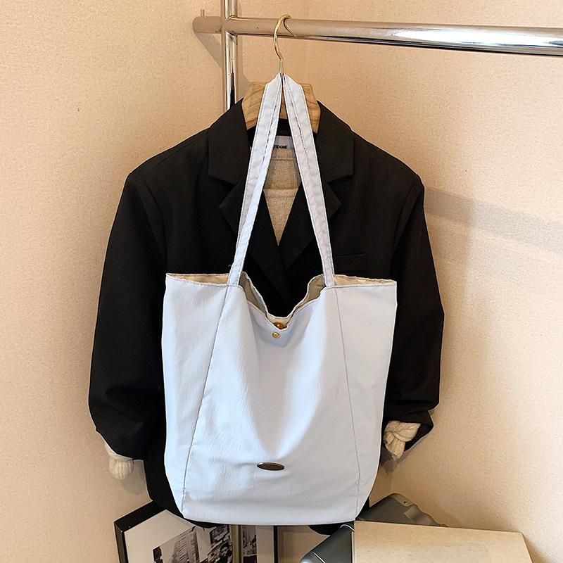 Summer new beautiful personalized casual shoulder bag female students class niche commuting tote big bag