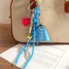 It is the same niche design PU blue shirt pendant keychain love braided rope versatile bag pendant accessories.