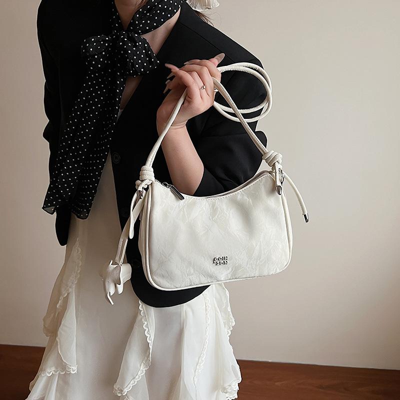 Fashion trend versatile women's bag light luxury casual shoulder armpit bag new niche casual commuter messenger bag