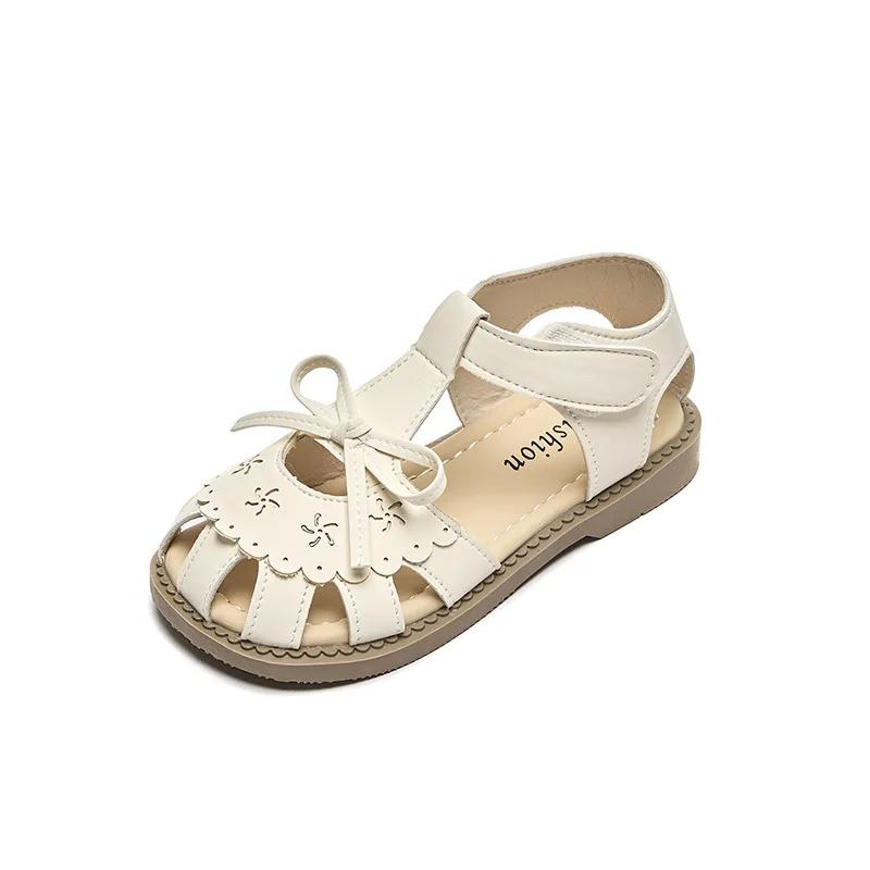 Kinder Prinzessinnenschuhe 2024 Sommer Neue Mädchen Sandalen mit Süßer Schleife Mädchen Hohle Strandschuhe für den Urlaub Vielseitige Mode Ballerinas