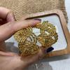 Wide-Faced Metal Woven Twist Earrings 2026 Premium Earrings Light Luxury Simple Style Studs