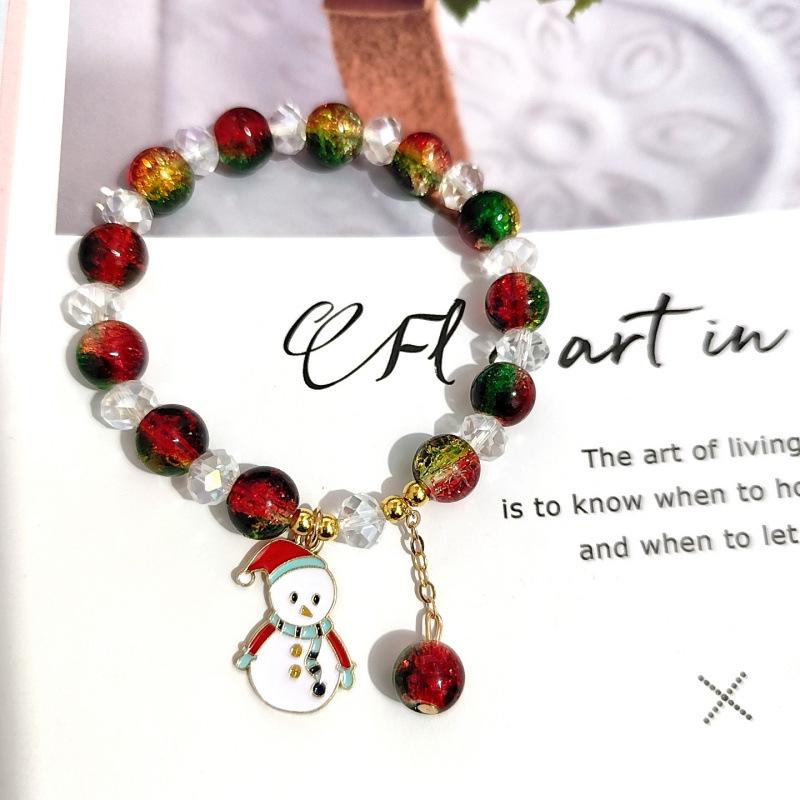 Temu Weihnachtsarmband mit Knisterperlen und Schneeflocken-, Baum-, Weihnachtsmann-, Glockenanhängern