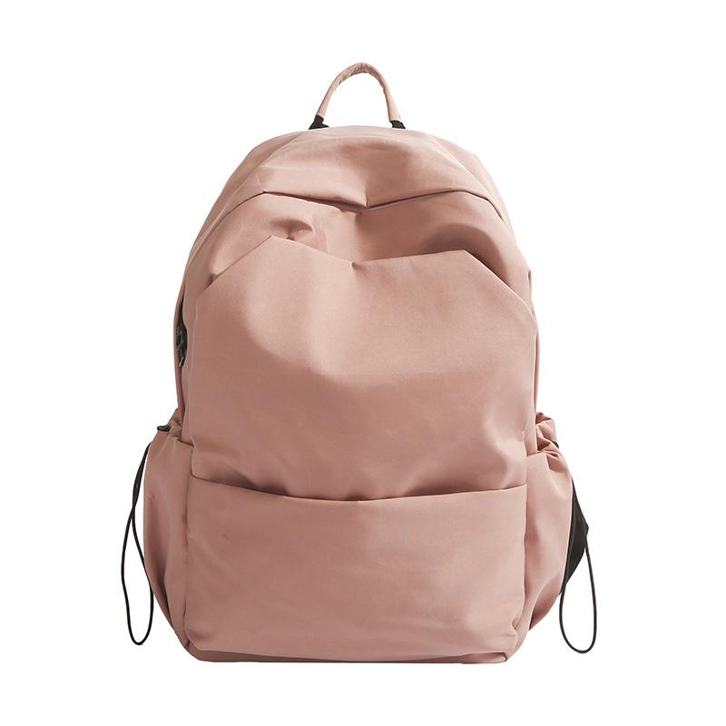 

Junior high school backpack large capacity solid color backpack male simple versatile high school college student schoolbag female рожевий
