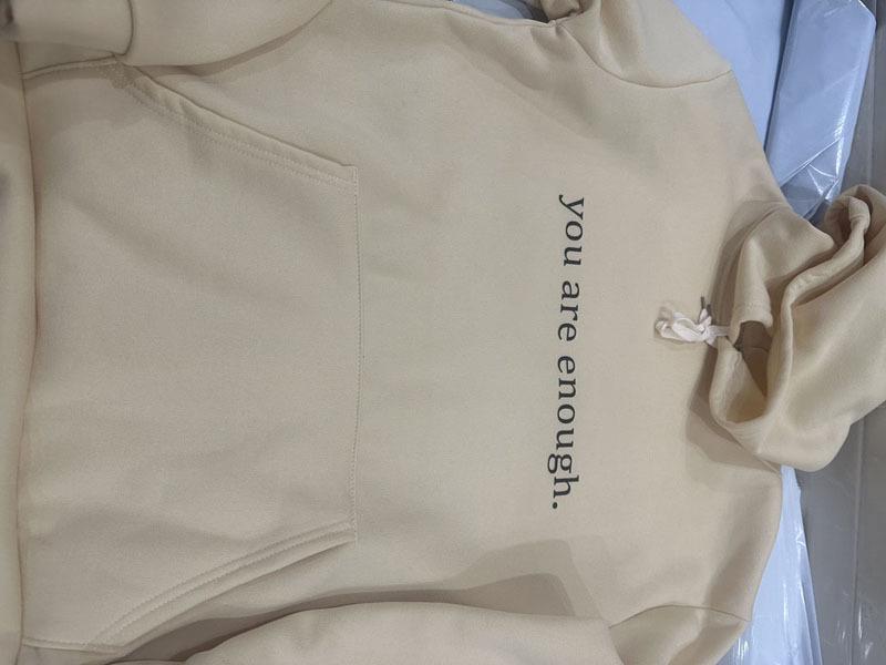 Damen Oversized Hoodie mit Fleece-Futter, Buchstaben-Slogan-Print, Kängurutasche und Kordelzug.