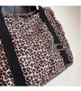 Leopard Print Canvas Tote: Large Capacity Autumn Shoulder Bag for Women, Versatile for College and Commute.