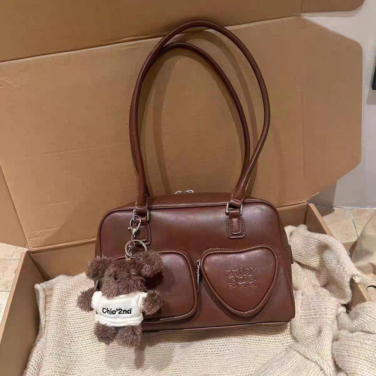 

Nanjia fashion trendy pictorial girl pillow bag this year is popular this year s popular bag women s handbag shoulder armpit bag