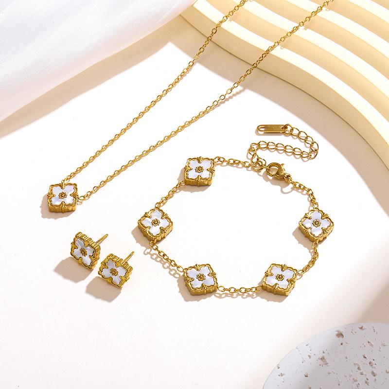 Retro Craftsmanship 18K Titanium Steel Four-Leaf Clover Jewelry Set: Flower Necklace, Bracelet, Earrings.