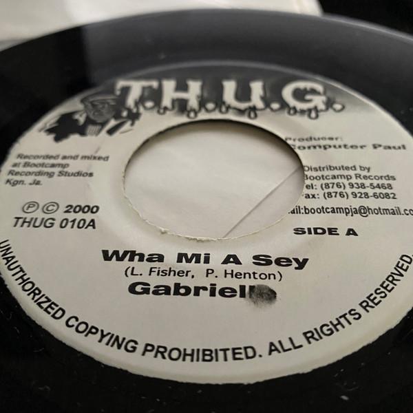 

7-дюймовая пластинка GABRIEL / ESCOBAR - Wha Mi A Sey / A Di Truth NONE T.H.U.G. 2000 Ямайка Регги, Ска и Даб Б/У