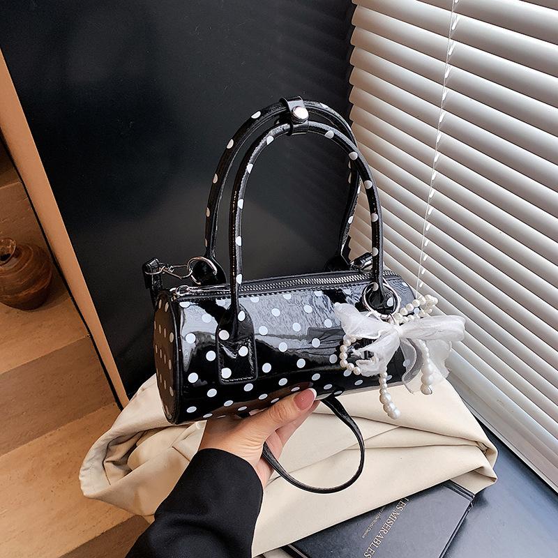 Niche design bag women's 2025 new summer shoulder messenger bag polka dot portable cylinder bag