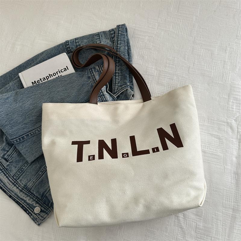 

Literary and versatile large-capacity thick canvas tote bag women s 2025 new high-end retro foreign shoulder bag белый